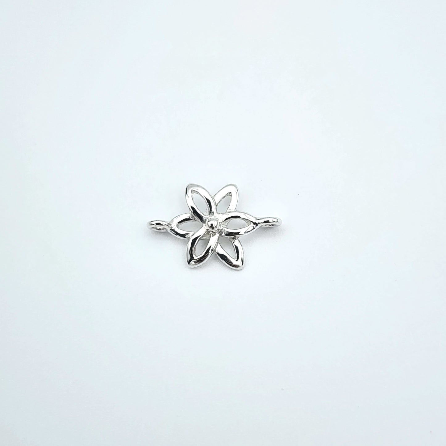Silver flower connector