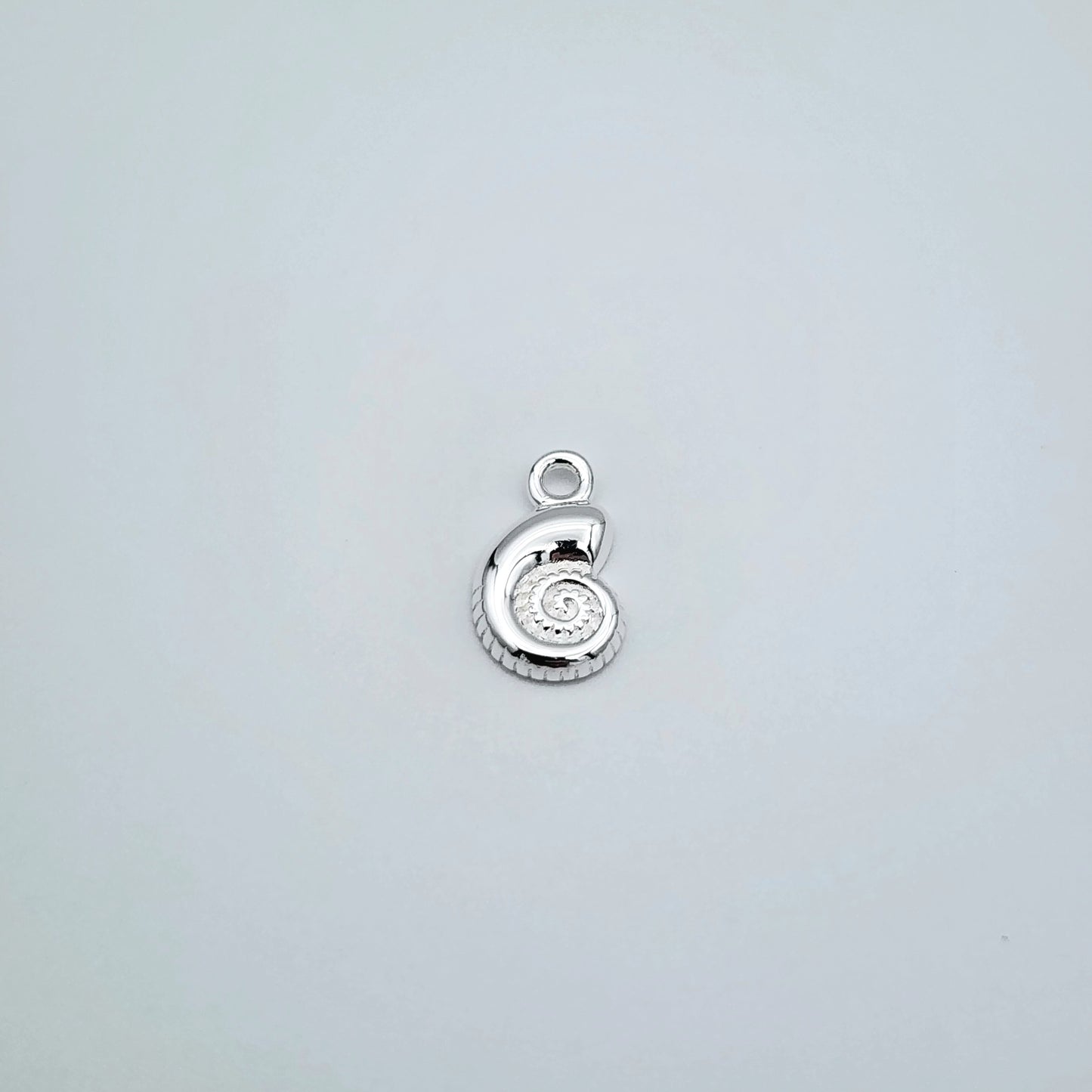 Silver snail charm