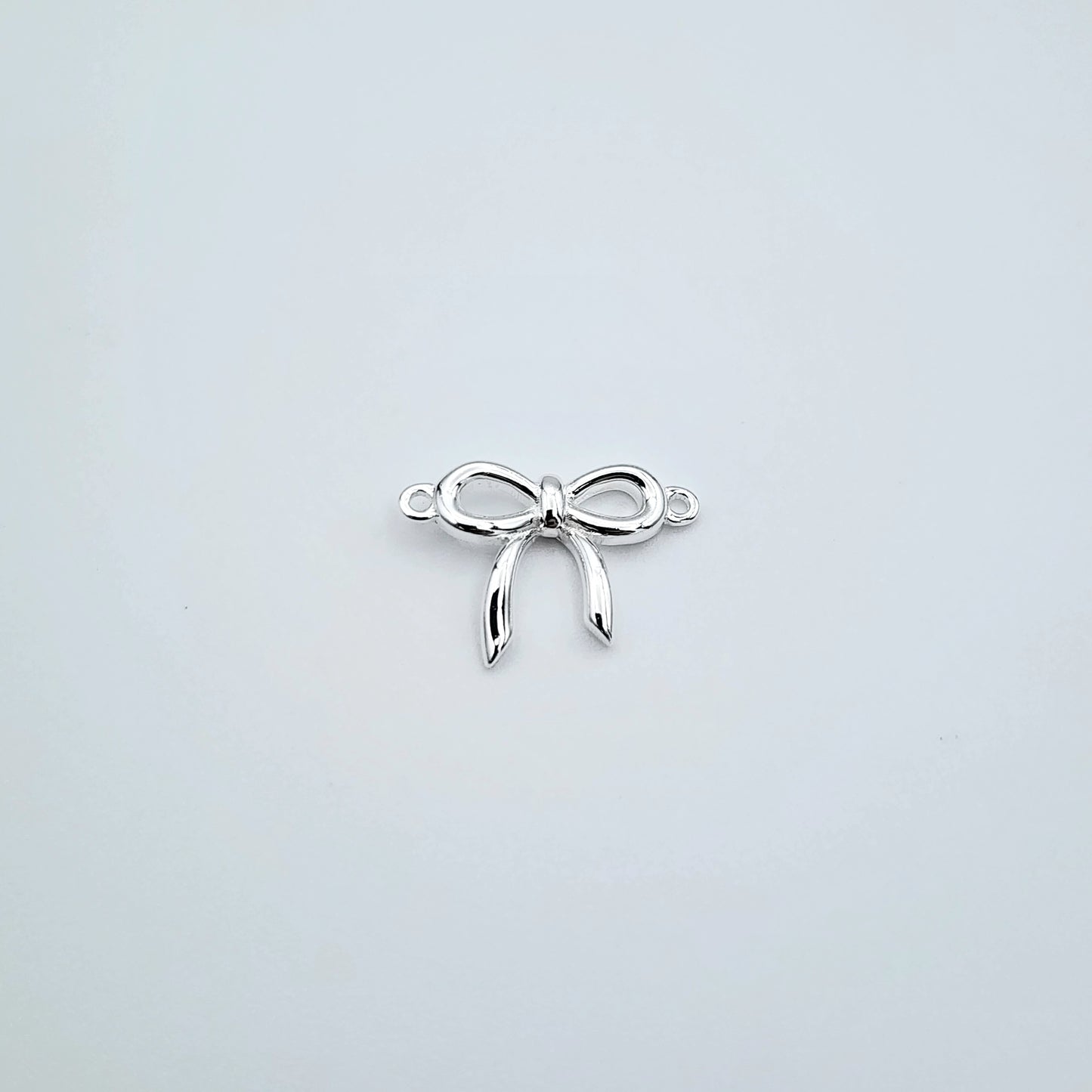 Silver thin bow connector
