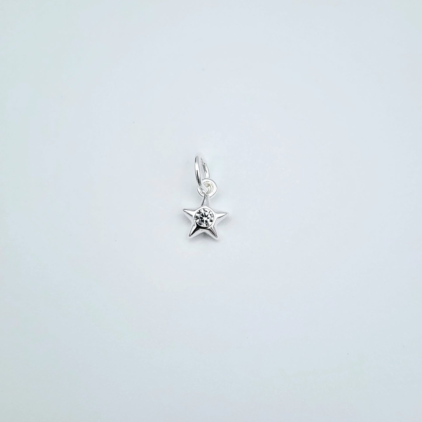 Silver cz star charm