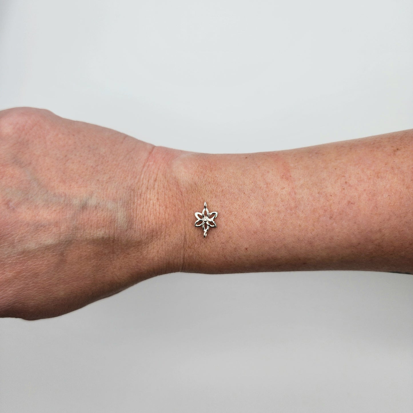 Silver flower connector size
