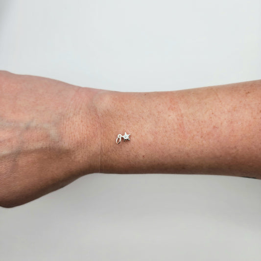 Silver cz star charm size