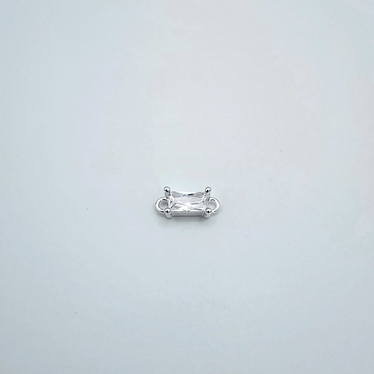 Silver emerald cut connector