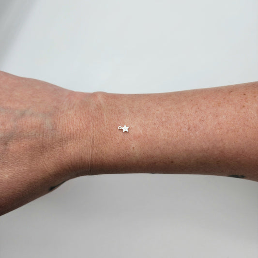 Silver heart charm size