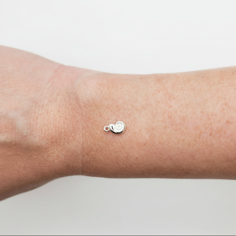 Silver snail charm