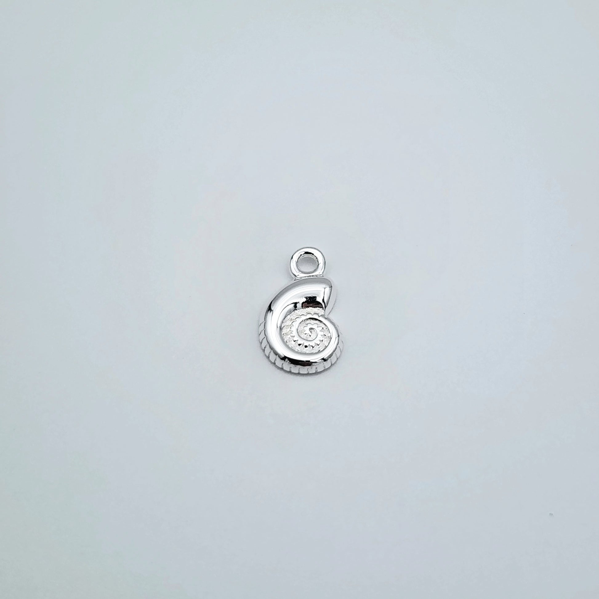 Silver snail charm