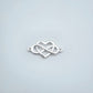 Silver infinity heart connector