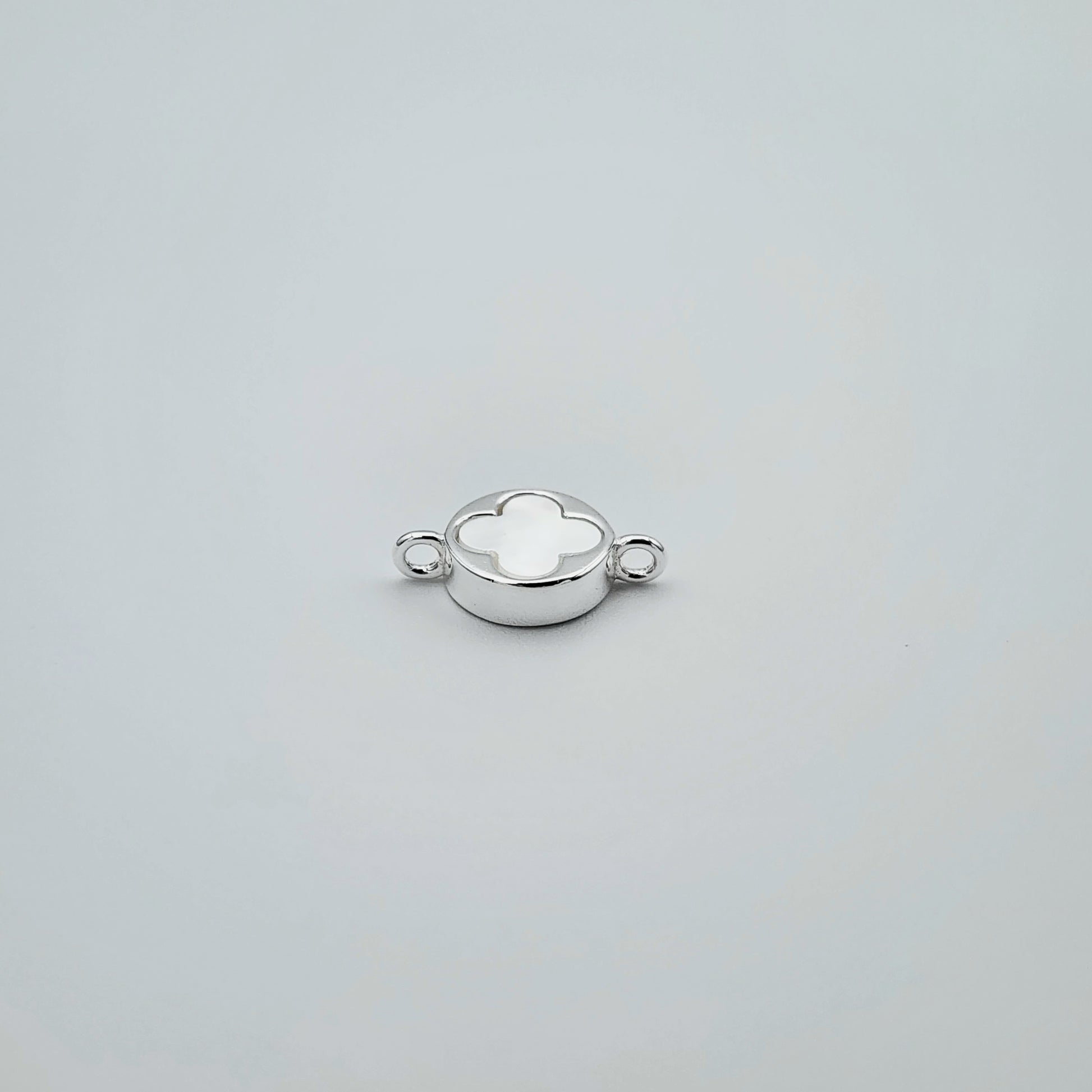 Silver mother of pearl connector