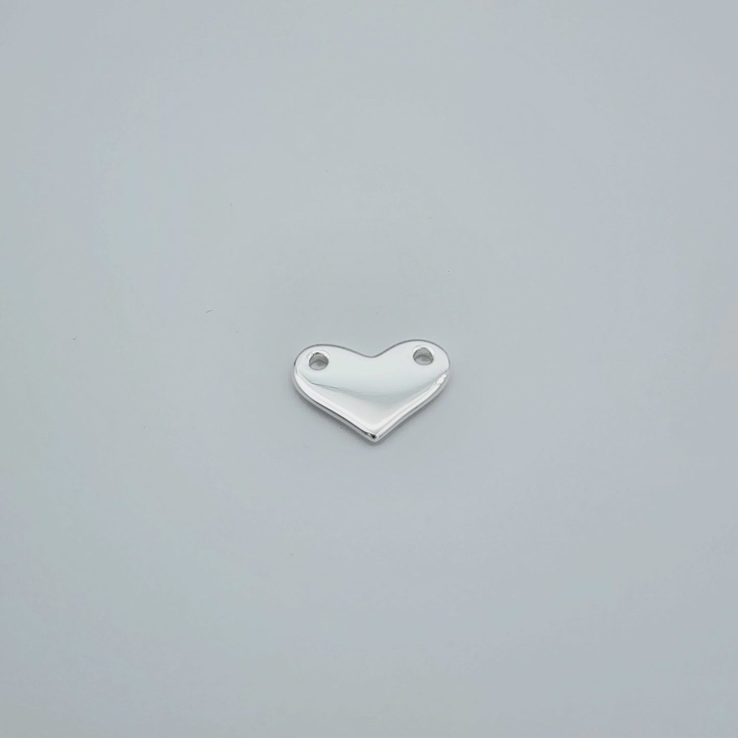 Silver heart connector