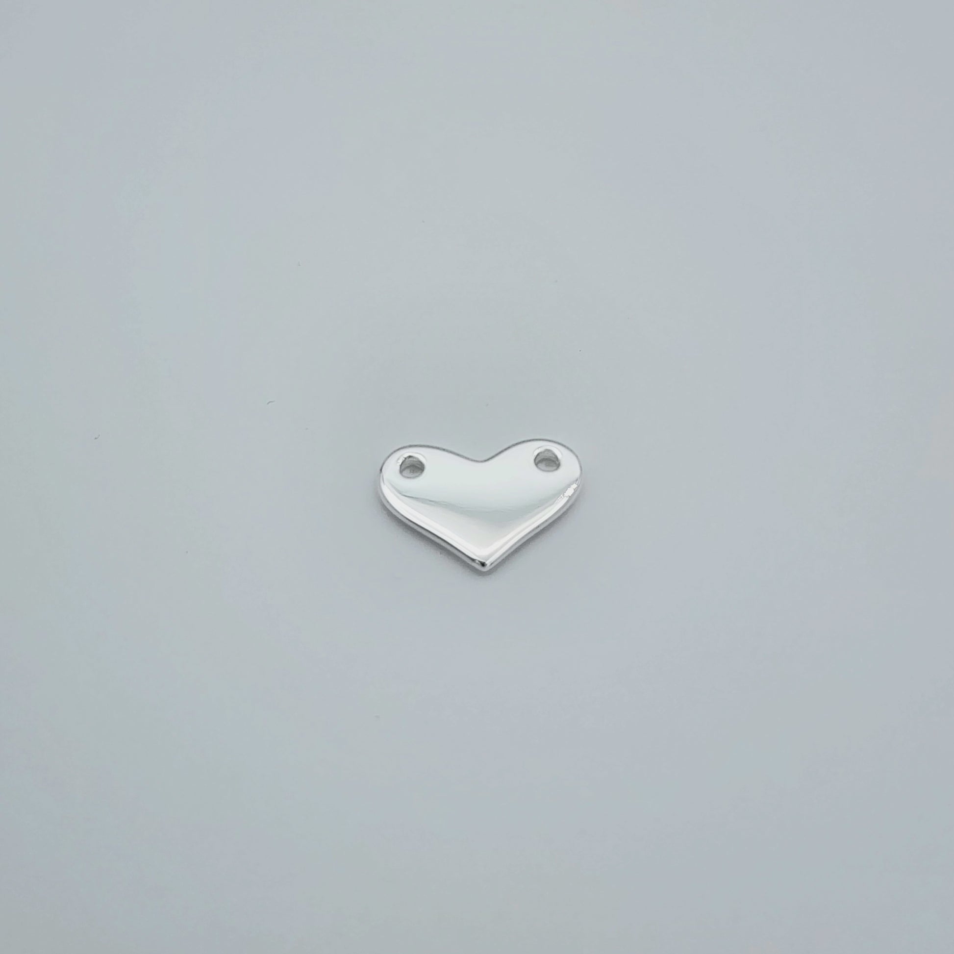 Silver heart connector