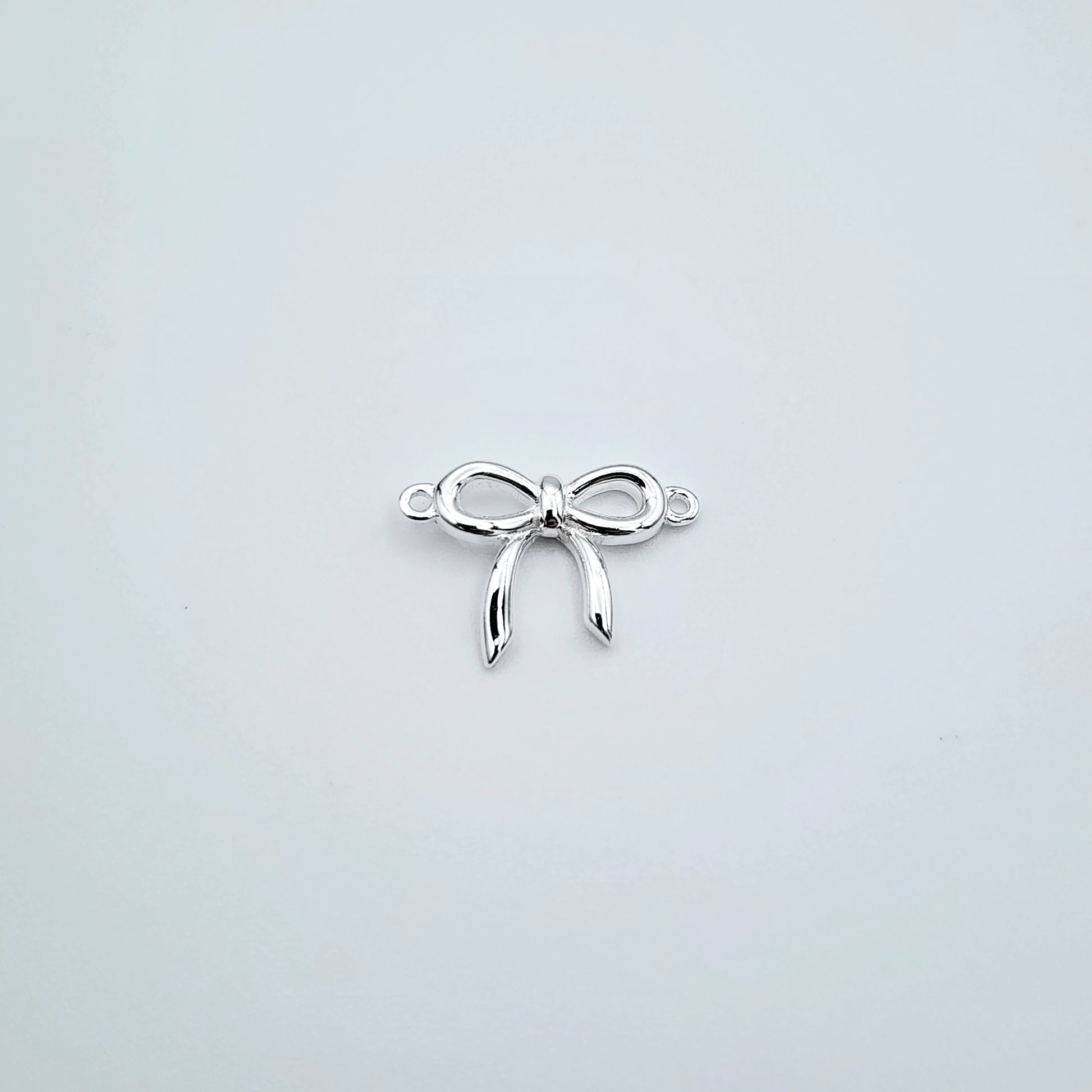 Silver thin bow connector