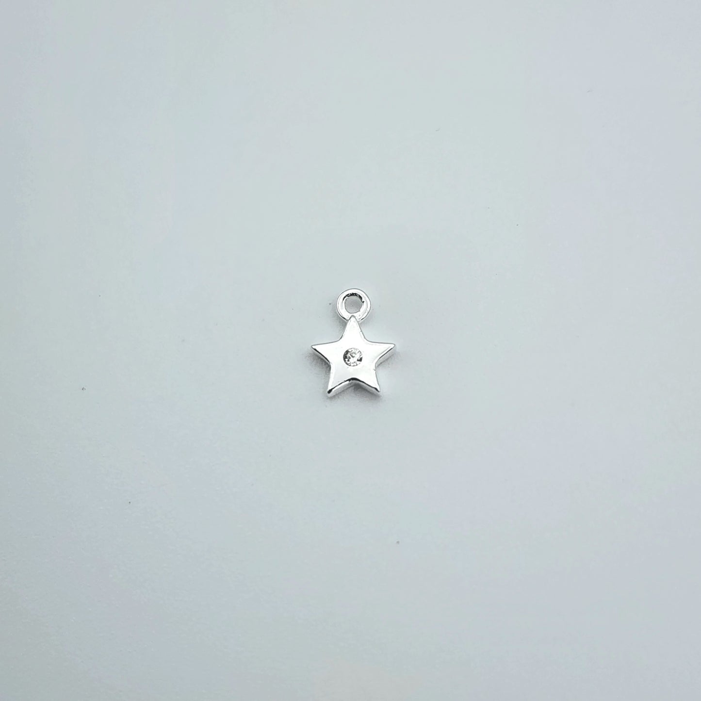 Silver star charm