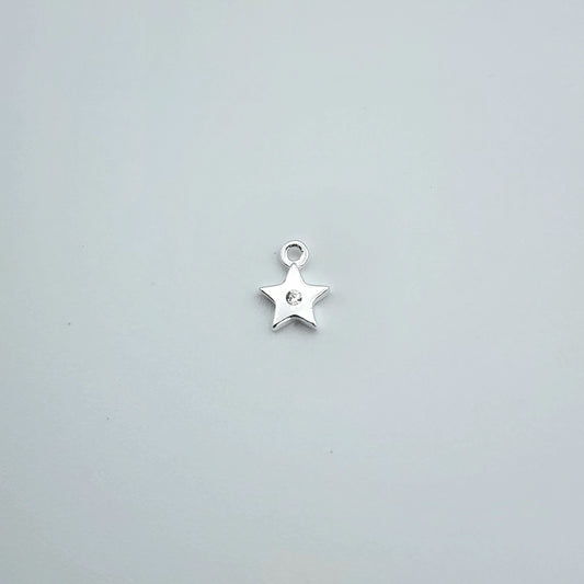 Silver star charm