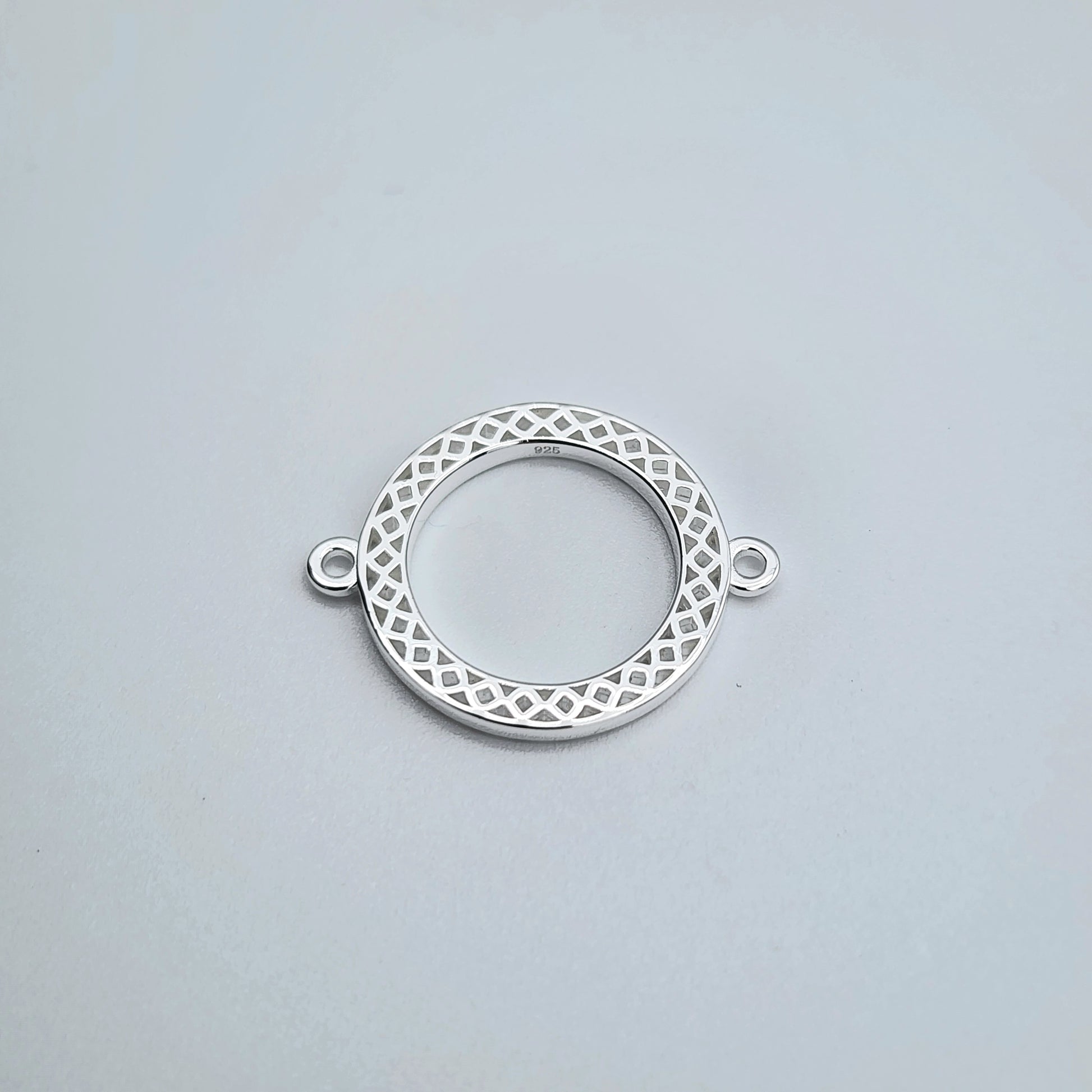 Silver round textured connector