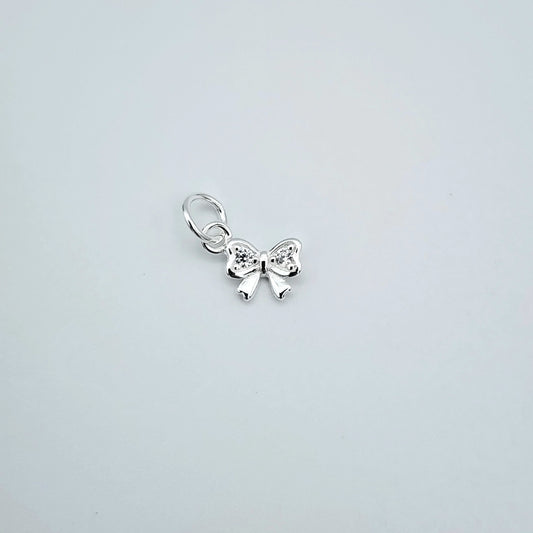 Silver cz bow charm