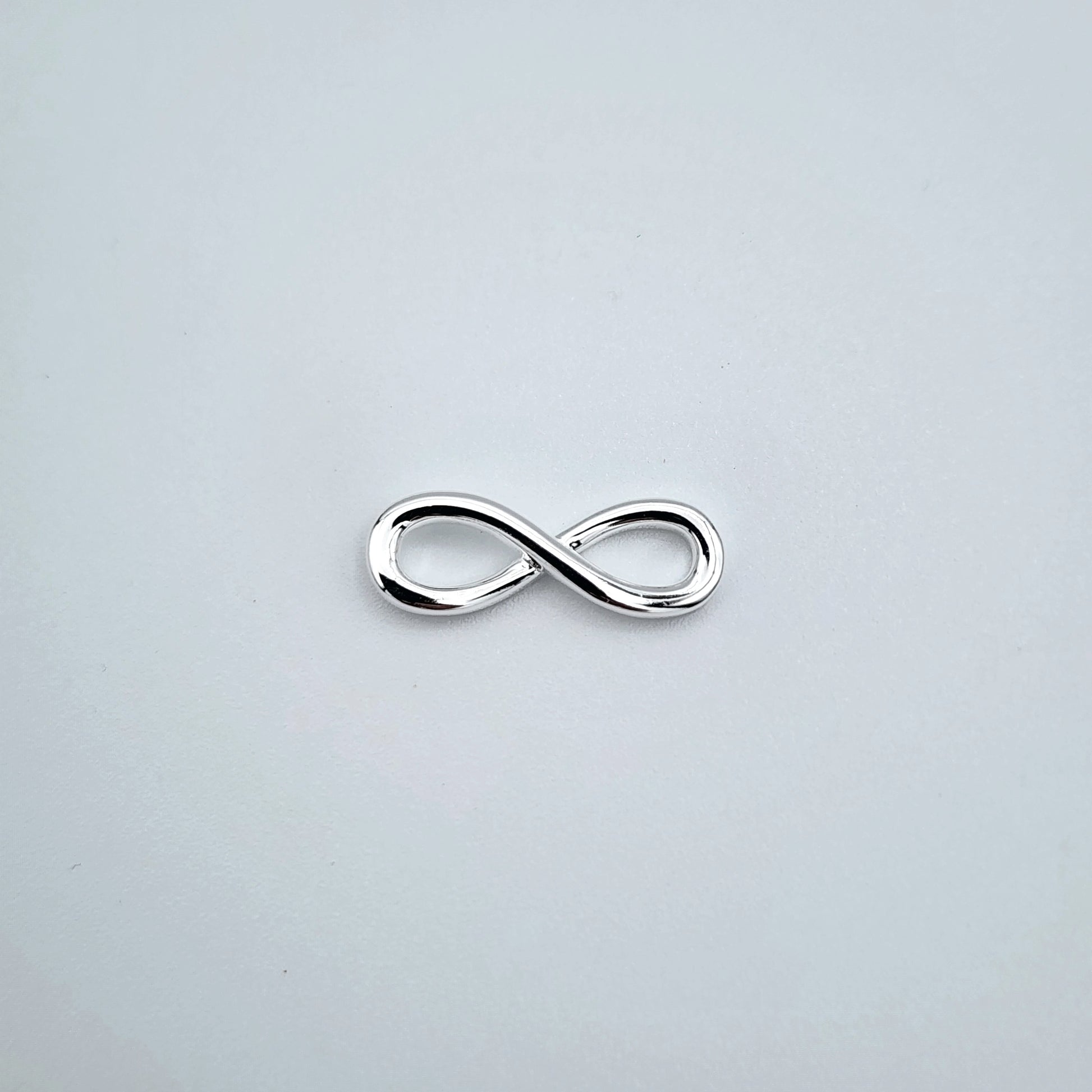 Silver infinity connector 