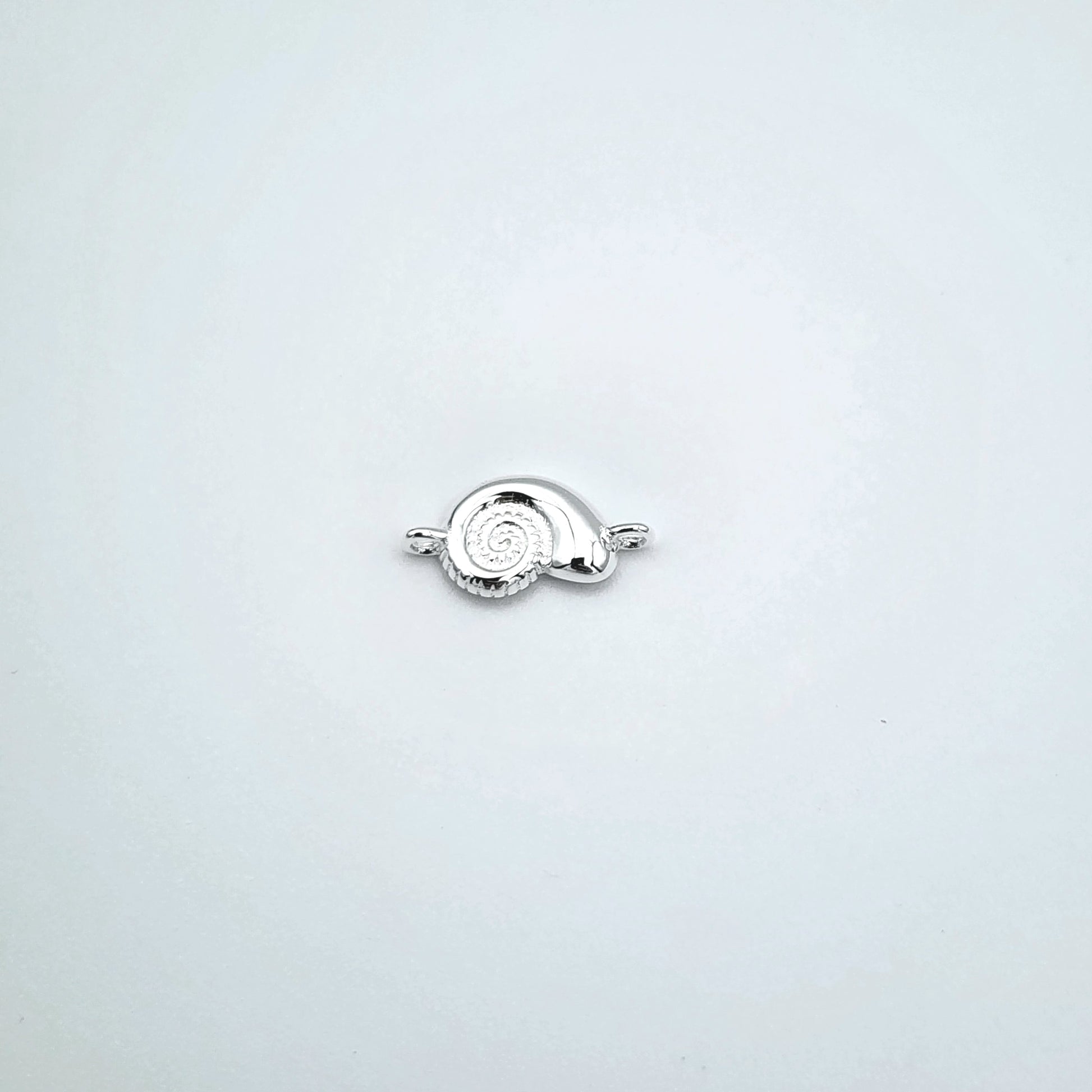 Silver sea snail connector