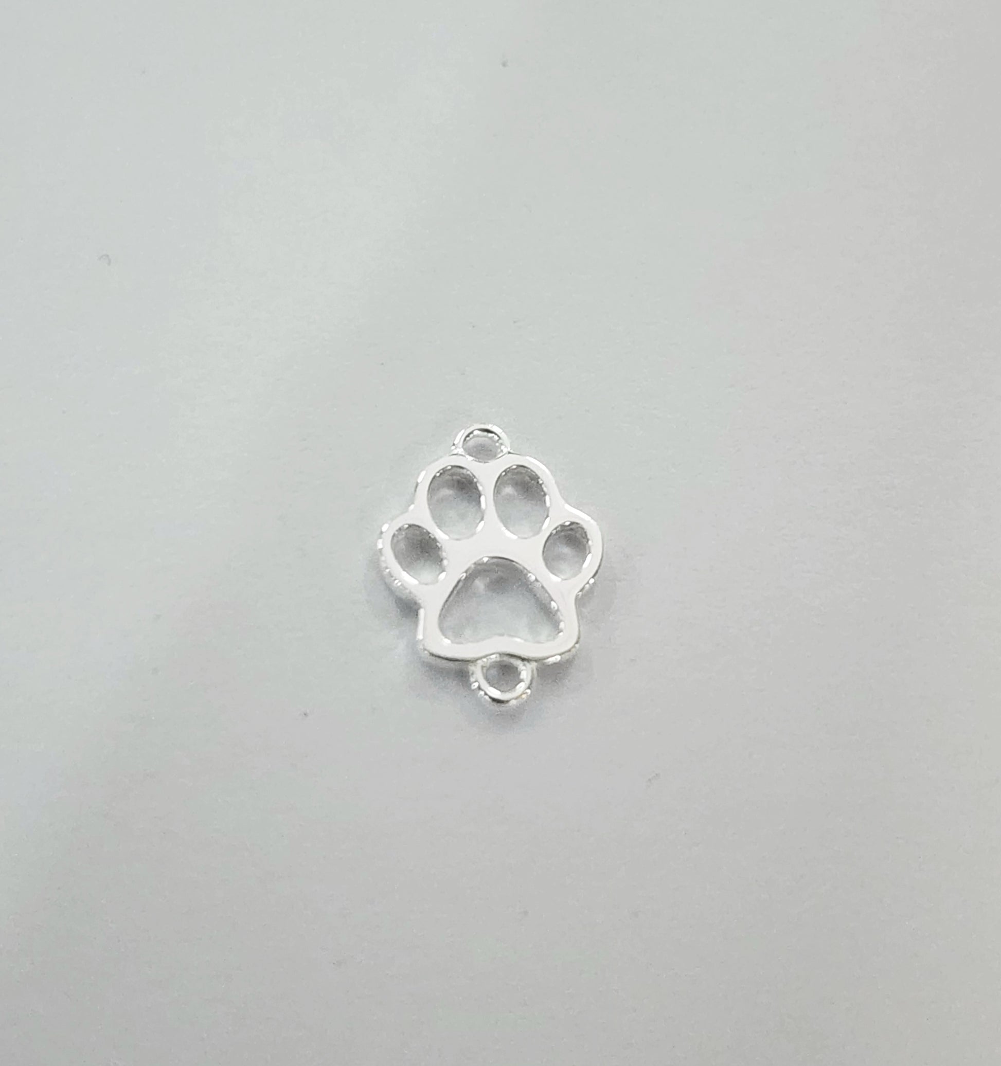 Sterling silver paw print connector